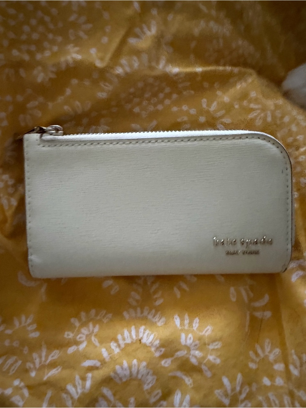 kate spade taupe zip-around wallet